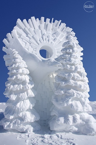 Photo:  Snow sculpture ... bird, trees, sunburst